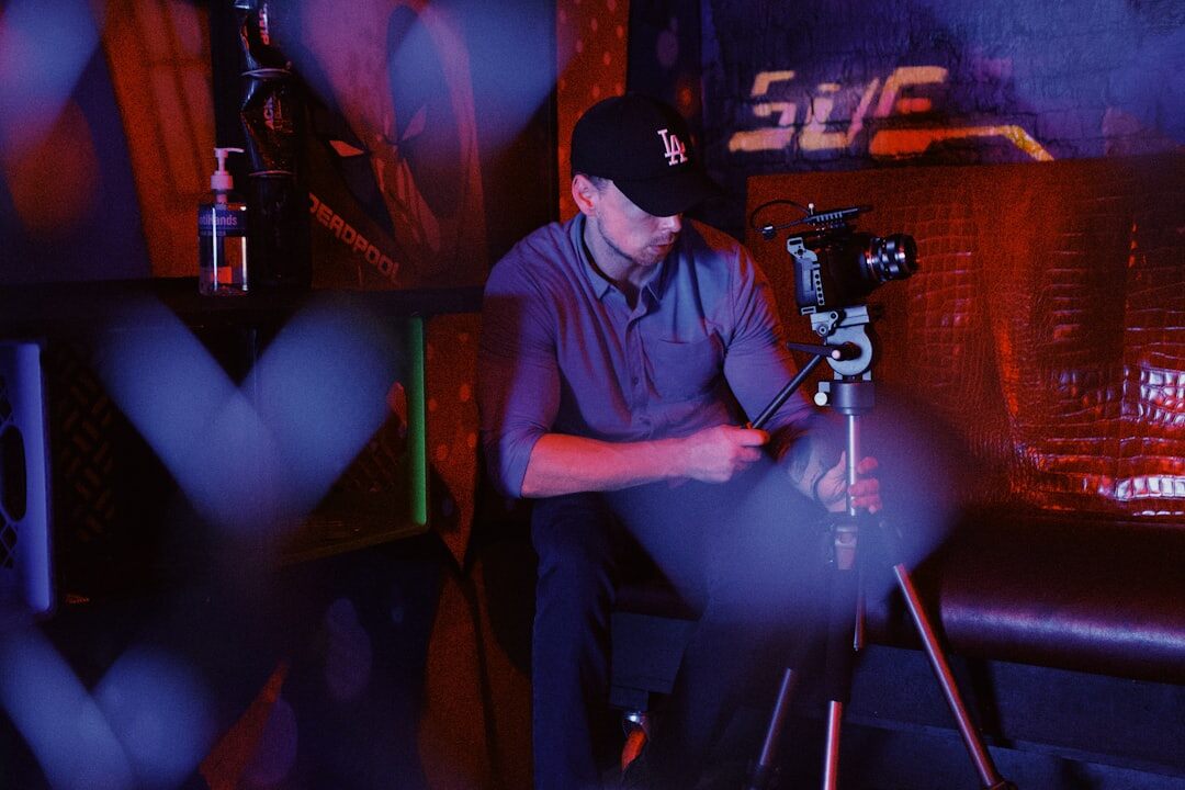 Broadcast crew setting up cameras and lighting for a live production